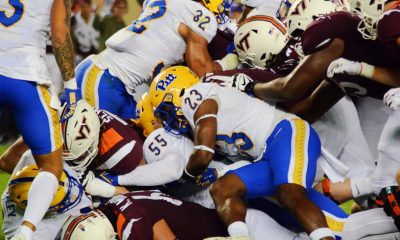 Pitt and Virginia Tech players pile up as the Hokies attempted a QB sneak on Saturday, Sept. 30, 2023 in Blacksburg, Virginia. (Mitchell Northam / Pittsburgh Sports Now.)